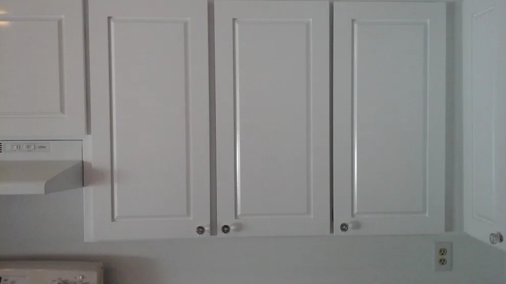 Cabinet Refurbishment with Paint in the Kitchen by Design Decorating & Kitchens LLC - Photo 5