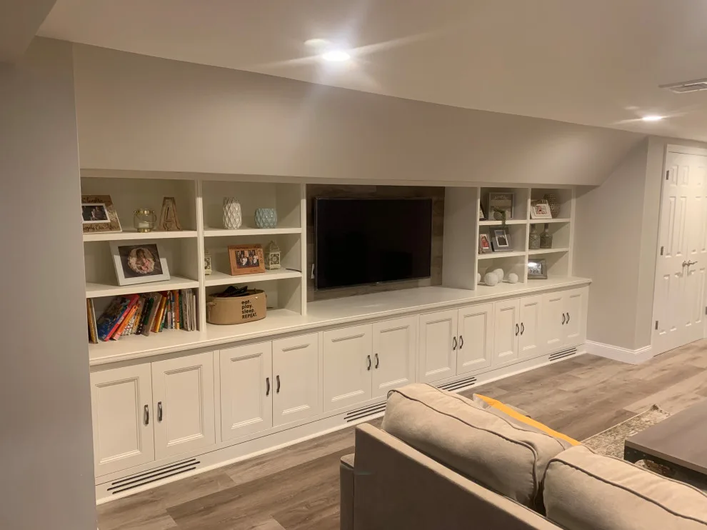 Basement Renovation with Integrated Storage by K & M Flooring-Renovations Inc. - Photo 3