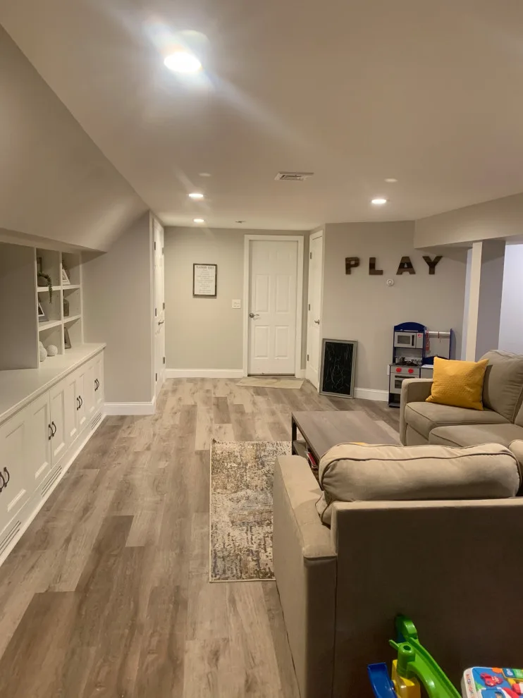 Basement Renovation with Integrated Storage by K & M Flooring-Renovations Inc. - Photo 6