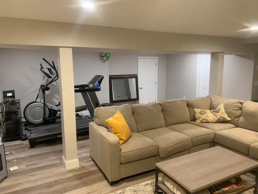 Basement Renovation with Integrated Storage by K & M Flooring-Renovations Inc. - Photo 5