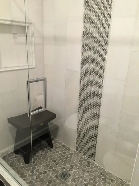 Exquisite Shower Tile Design by K & M Flooring-Renovations Inc. - Photo 7
