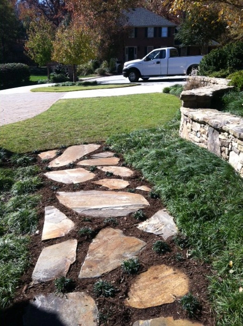 Homestead Lawn & Landscape - Photo 11