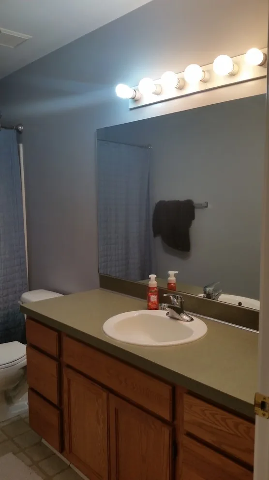 Rockford Dual Bathroom Renovation by DreamMaker Bath & Kitchen Of Greater Grand Rapids - Photo 3