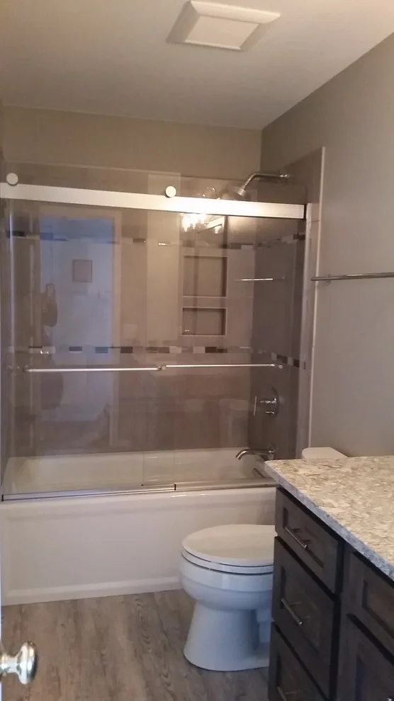 Rockford Dual Bathroom Renovation by DreamMaker Bath & Kitchen Of Greater Grand Rapids - Photo 15