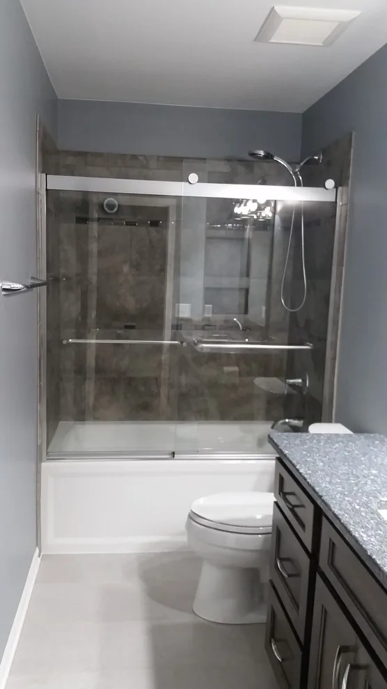 Rockford Dual Bathroom Renovation by DreamMaker Bath & Kitchen Of Greater Grand Rapids - Photo 11