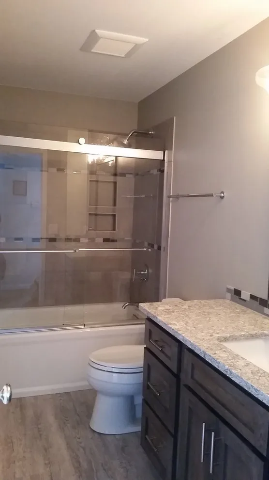 Rockford Dual Bathroom Renovation by DreamMaker Bath & Kitchen Of Greater Grand Rapids - Photo 9