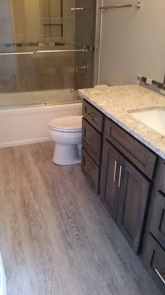 Rockford Dual Bathroom Renovation by DreamMaker Bath & Kitchen Of Greater Grand Rapids - Photo 2