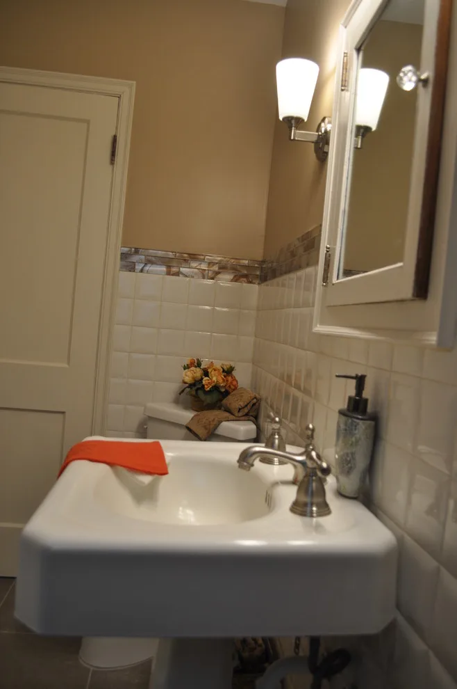 Compact main level restroom by Luxury Bath Remodeling - Photo 3