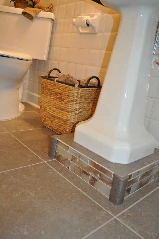 Compact main level restroom by Luxury Bath Remodeling - Photo 2