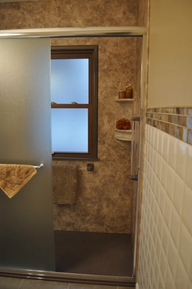 Compact main level restroom by Luxury Bath Remodeling - Photo 9