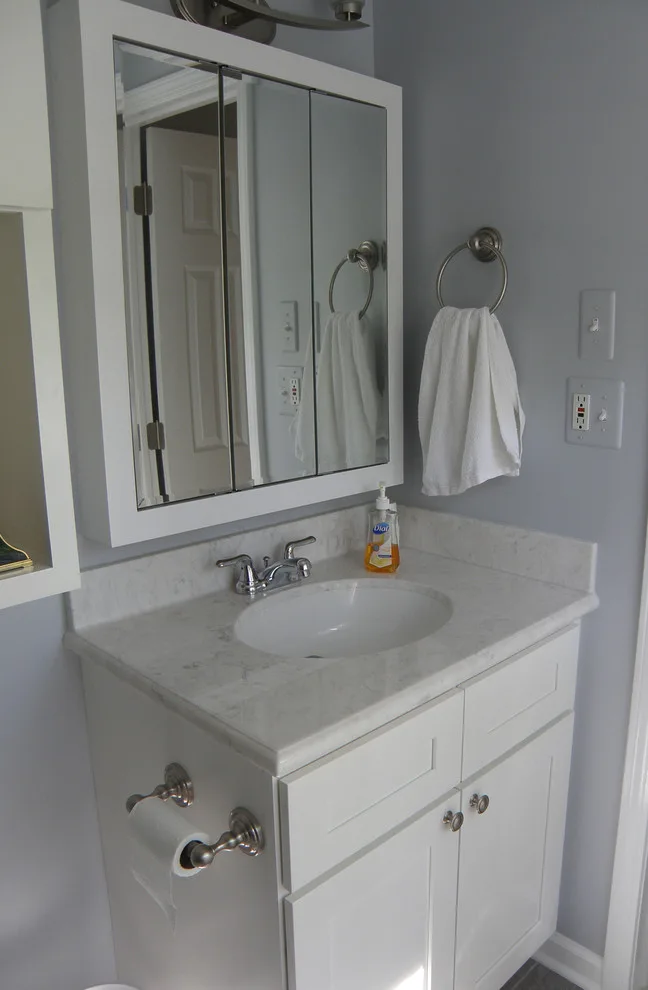 Compact Sterling Heights Bathroom Makes a Bold Impression by Kopke Remodeling & Design - Photo 32