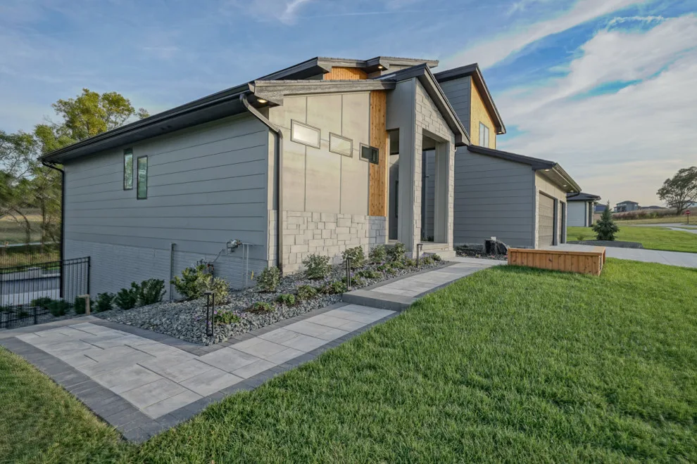 1.5-Story Home Featuring Tesla Solar Roof by Sierra Homes (Omaha, NE) - Photo 6