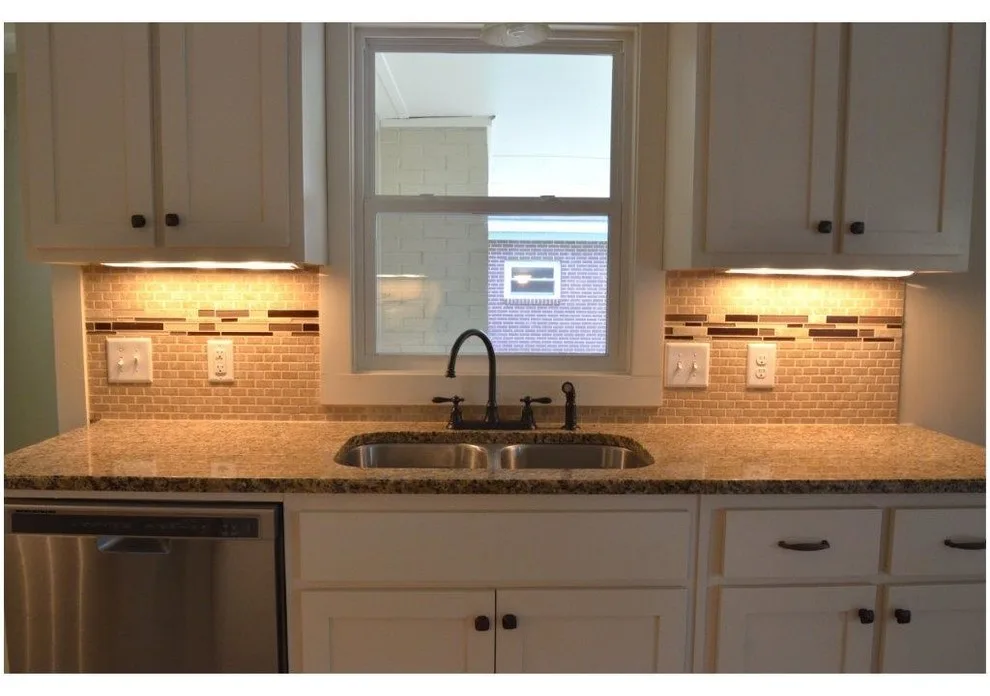 Comprehensive home makeover featuring craftsman-style details by Pythoge Custom Homes And Renovations - Photo 5