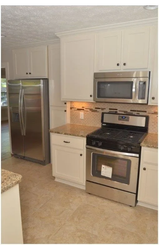 Comprehensive home makeover featuring craftsman-style details by Pythoge Custom Homes And Renovations - Photo 33