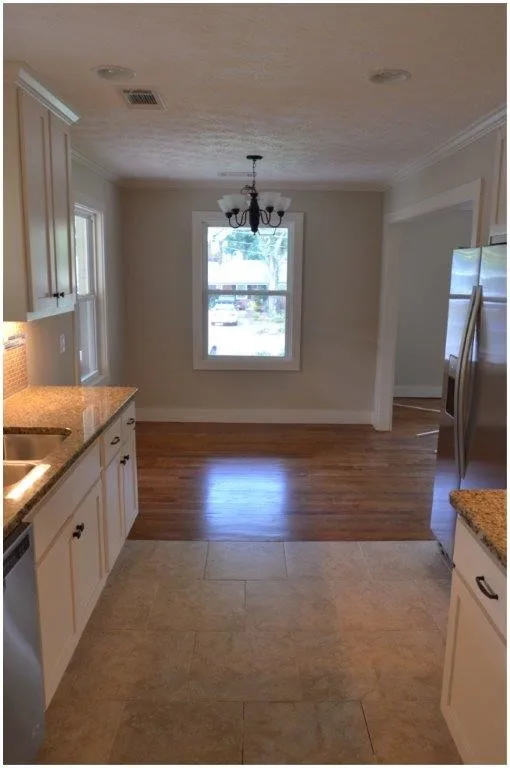 Comprehensive home makeover featuring craftsman-style details by Pythoge Custom Homes And Renovations - Photo 9