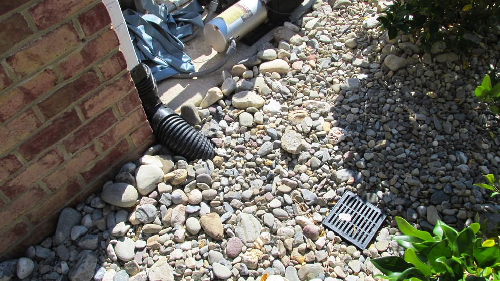 Solving a Drainage Problem by Dr. Dan's Landscaping & Architectural Design - Photo 3