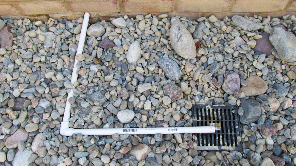 Solving a Drainage Problem by Dr. Dan's Landscaping & Architectural Design - Photo 9