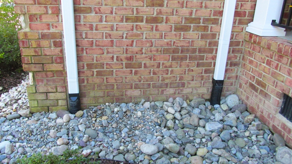 Solving a Drainage Problem by Dr. Dan's Landscaping & Architectural Design - Photo 2