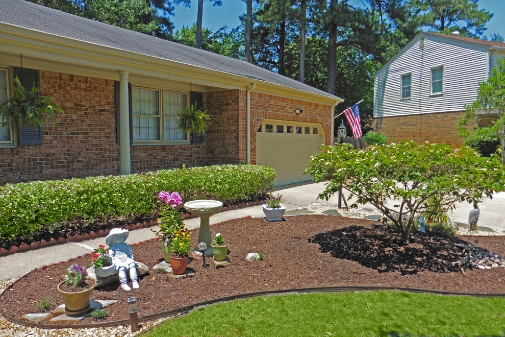 Bringing back an overgrown landscape by Dr. Dan's Landscaping & Architectural Design - Photo 5