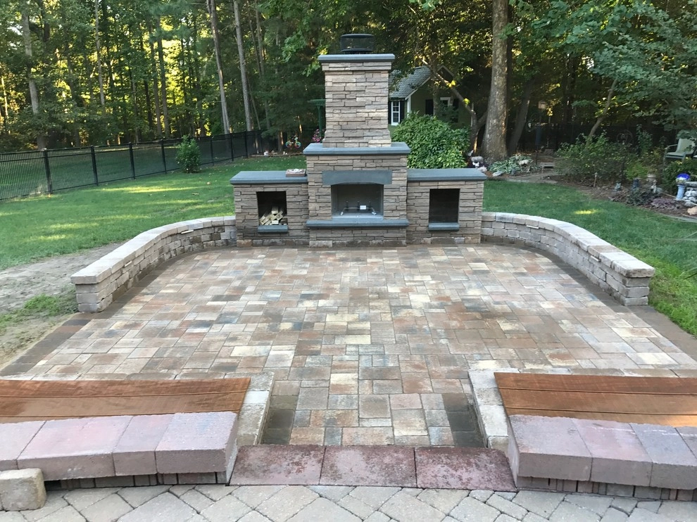 Patio With Water Features and Fireplace by Dreamscape Designers Landscape Company - Photo 6