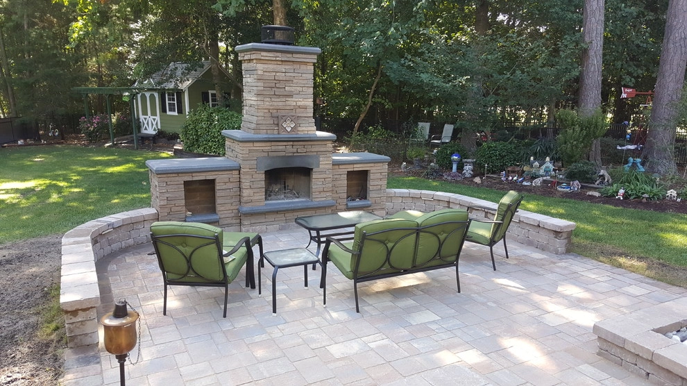 Patio With Water Features and Fireplace by Dreamscape Designers Landscape Company - Photo 3
