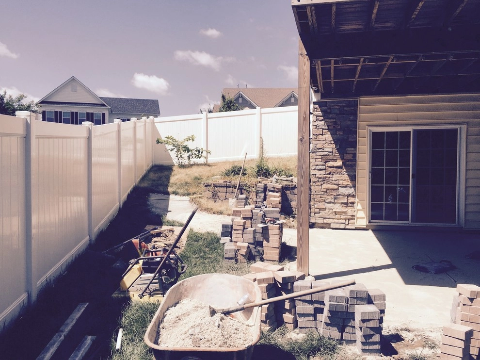 Retaining Wall with a Walkway and Patio by Dreamscape Designers Landscape Company - Photo 6