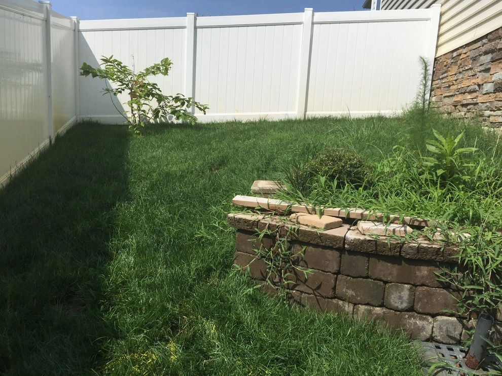 Retaining Wall with a Walkway and Patio by Dreamscape Designers Landscape Company - Photo 7