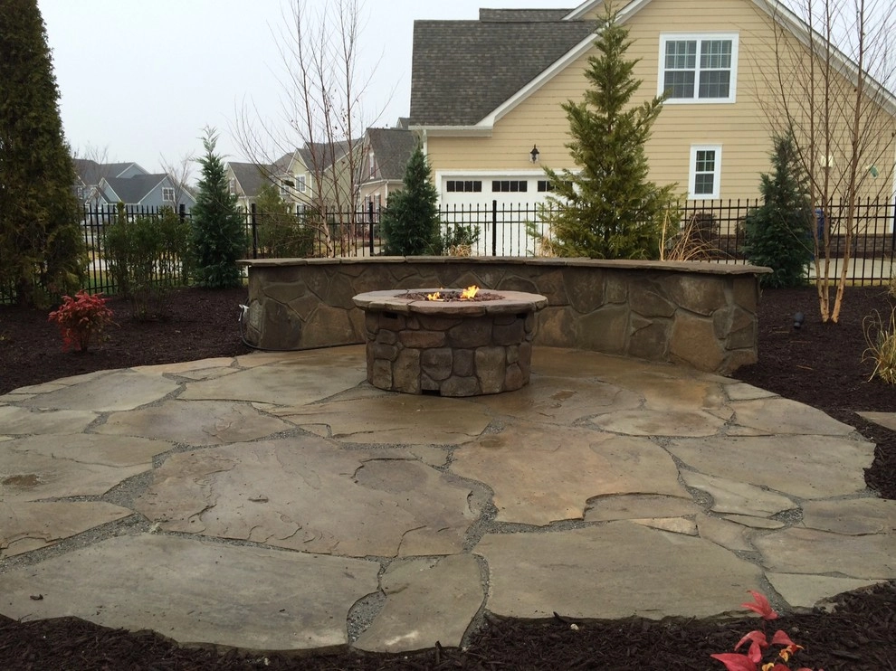 Natural Stone Patio with Firepit by Dreamscape Designers Landscape Company - Photo 3