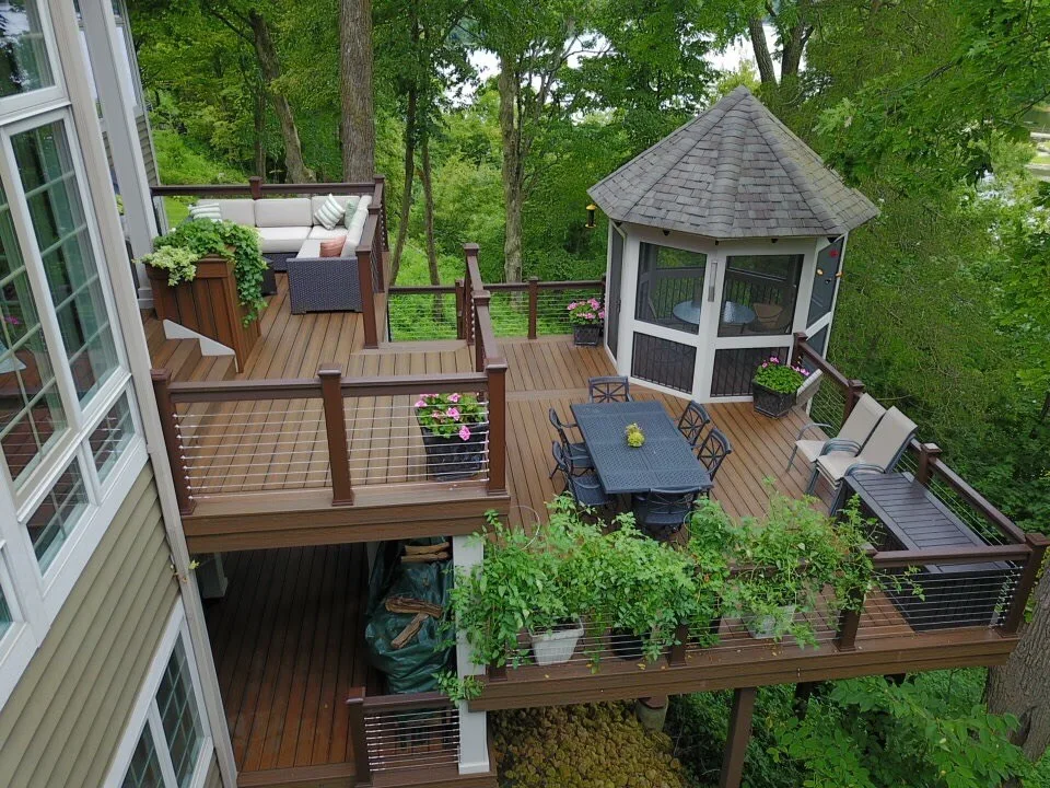 Tiered Trex Deck with Cable Railing by Galena Hillside Homes - Photo 19