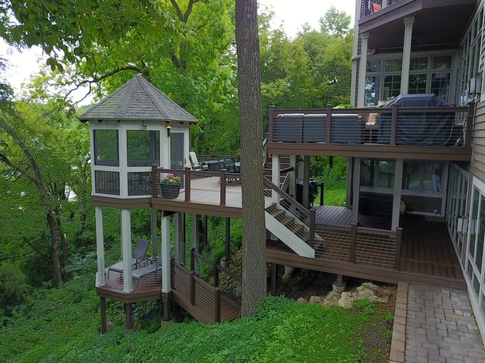 Tiered Trex Deck with Cable Railing by Galena Hillside Homes - Photo 11