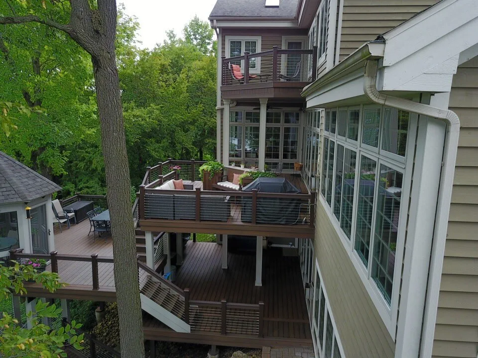Tiered Trex Deck with Cable Railing by Galena Hillside Homes - Photo 20