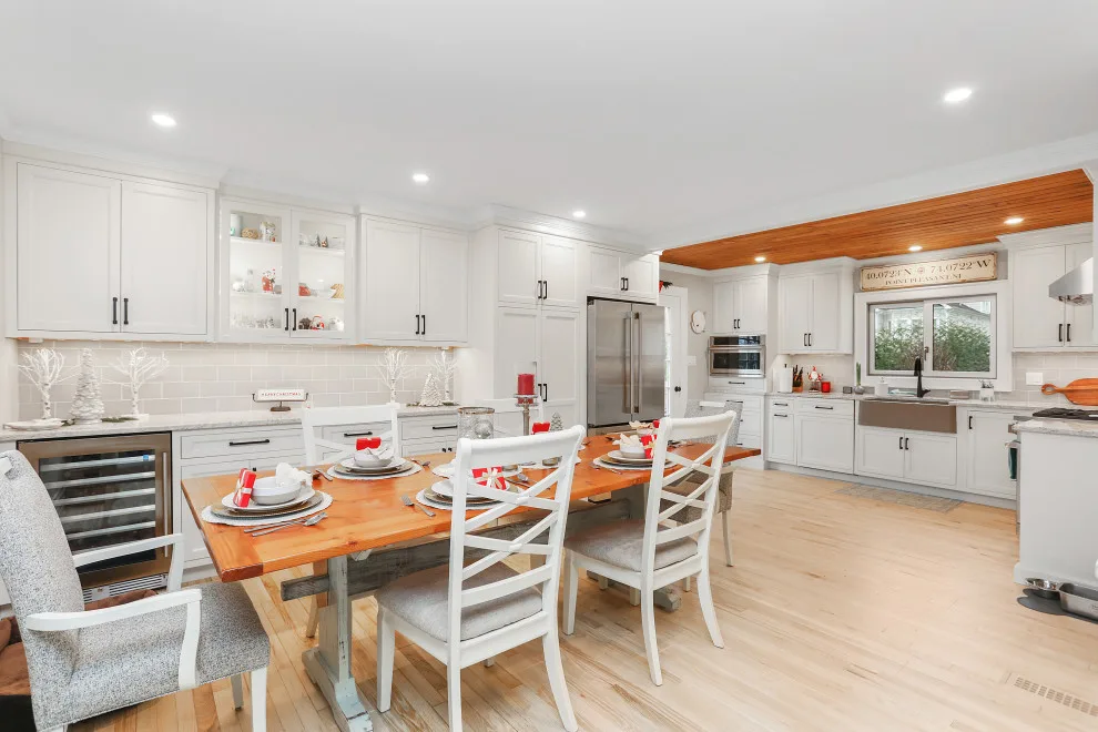 A Festive Coastal Kitchen by Baine Contracting, Inc. - Photo 33