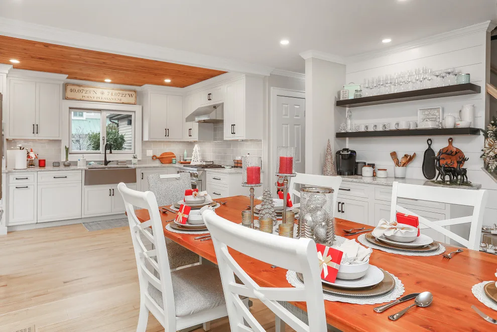 A Festive Coastal Kitchen by Baine Contracting, Inc. - Photo 22