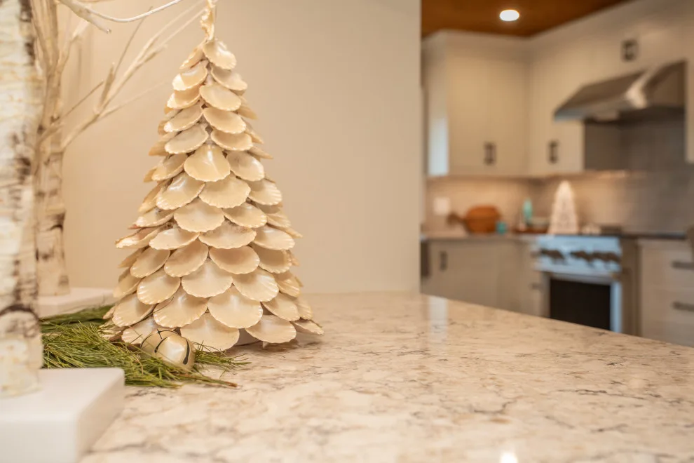 A Festive Coastal Kitchen by Baine Contracting, Inc. - Photo 32