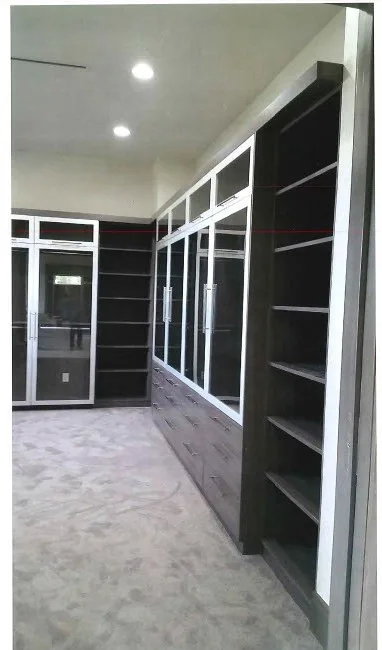 Expansive Tailored Floor-to-Ceiling Cabinetry by Home Design Construction - Photo 4