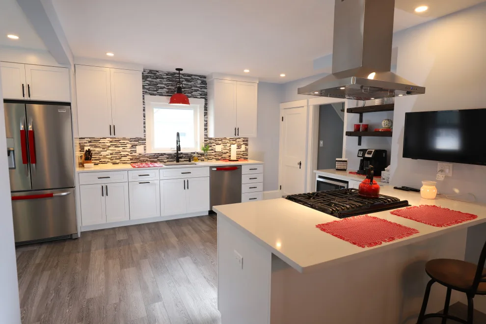 Stoneham Culinary and Laundry Room by Godfrey Design-Build, LLC - Photo 9
