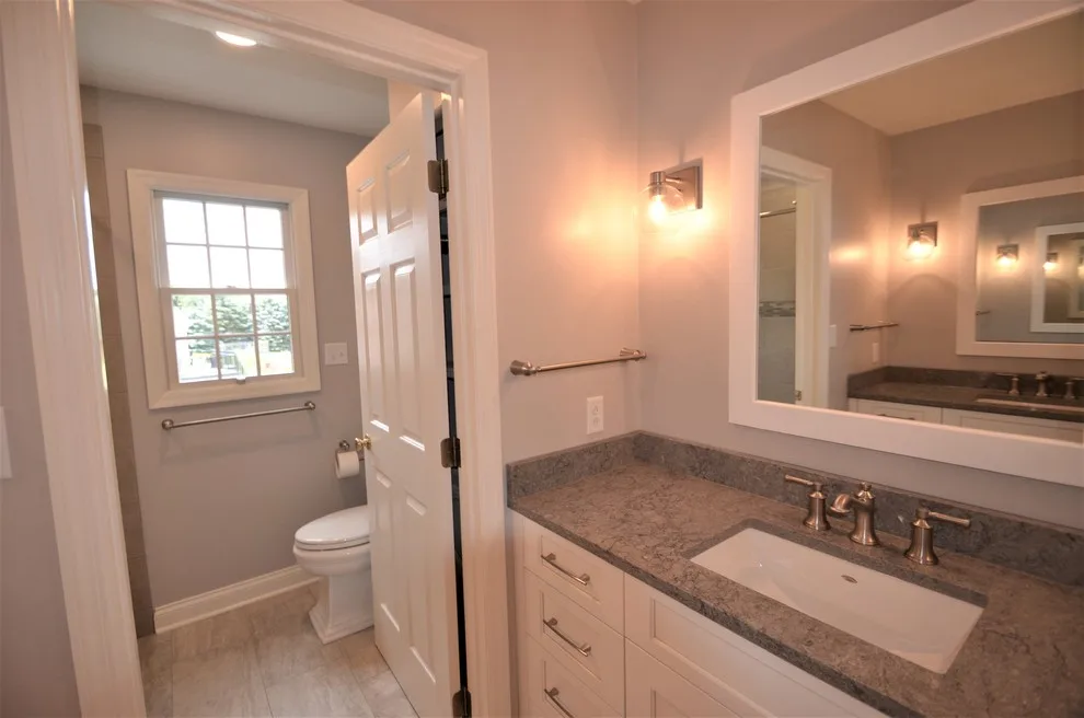 Complete Makeover - Master Bathroom, Guest Bathroom & Powder Room by Conrad Kitchen, Bath And Remodeling LLC - Photo 6