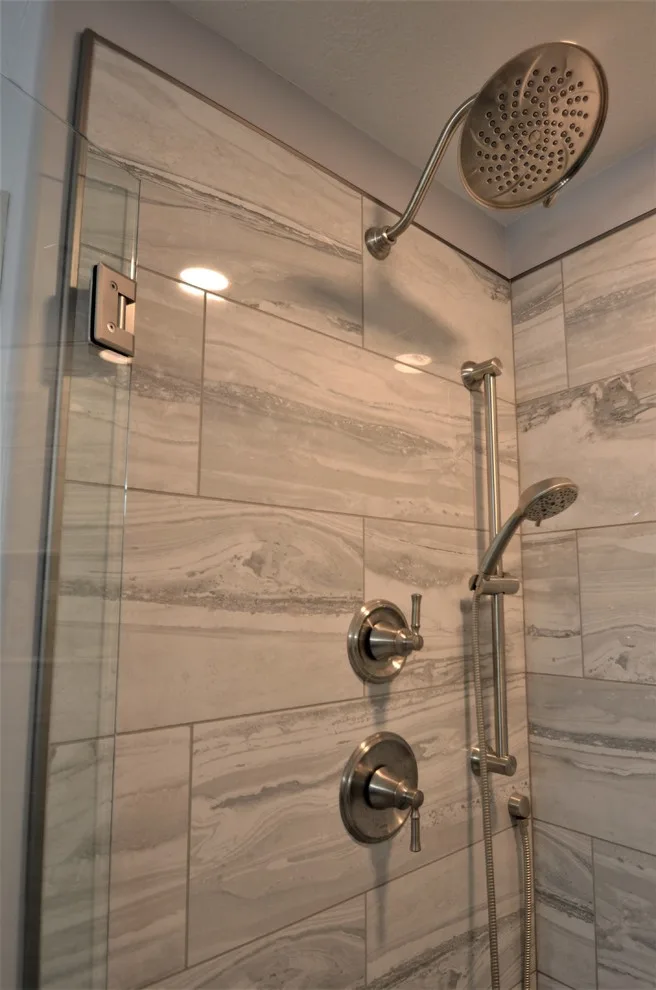 Complete Makeover - Master Bathroom, Guest Bathroom & Powder Room by Conrad Kitchen, Bath And Remodeling LLC - Photo 13