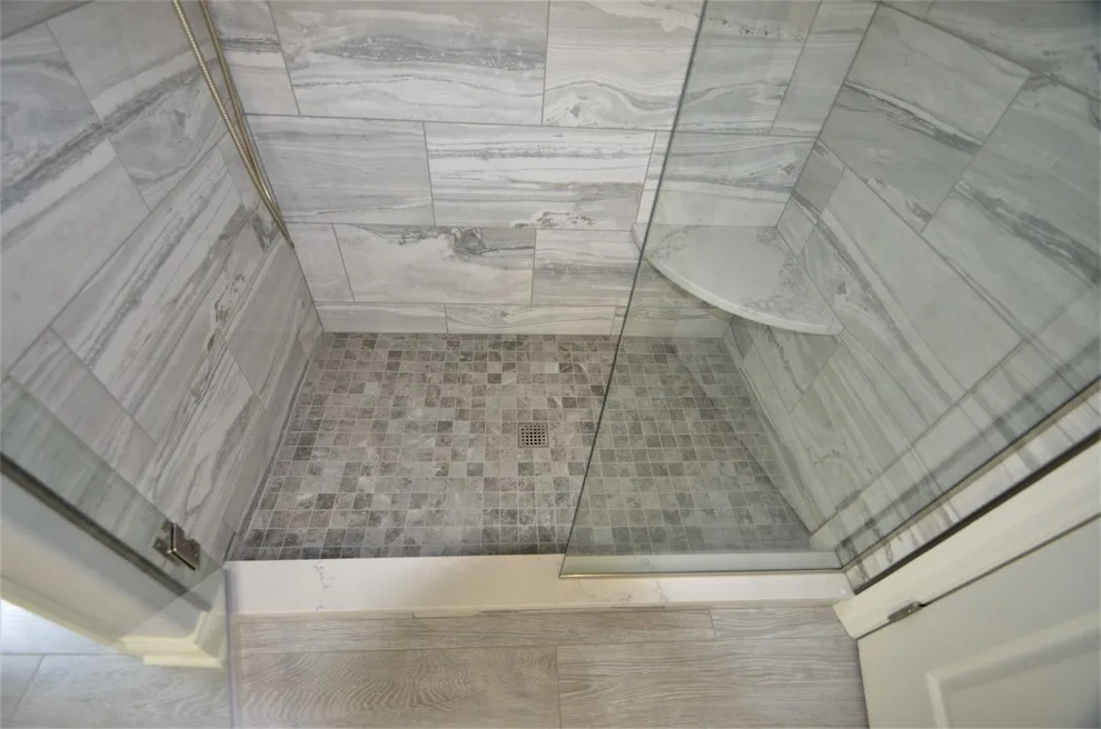 Complete Makeover - Master Bathroom, Guest Bathroom & Powder Room by Conrad Kitchen, Bath And Remodeling LLC - Photo 18