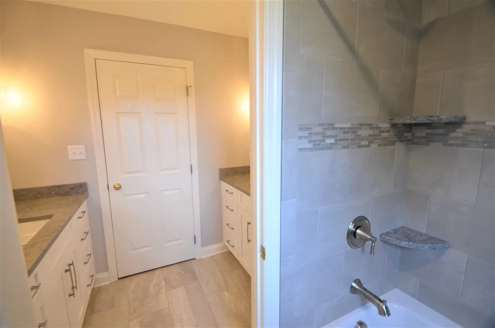 Complete Makeover - Master Bathroom, Guest Bathroom & Powder Room by Conrad Kitchen, Bath And Remodeling LLC - Photo 19