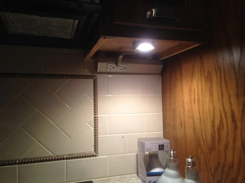 Classic Kitchen with Sleek Backsplash by In A Week. Guaranteed - Photo 5