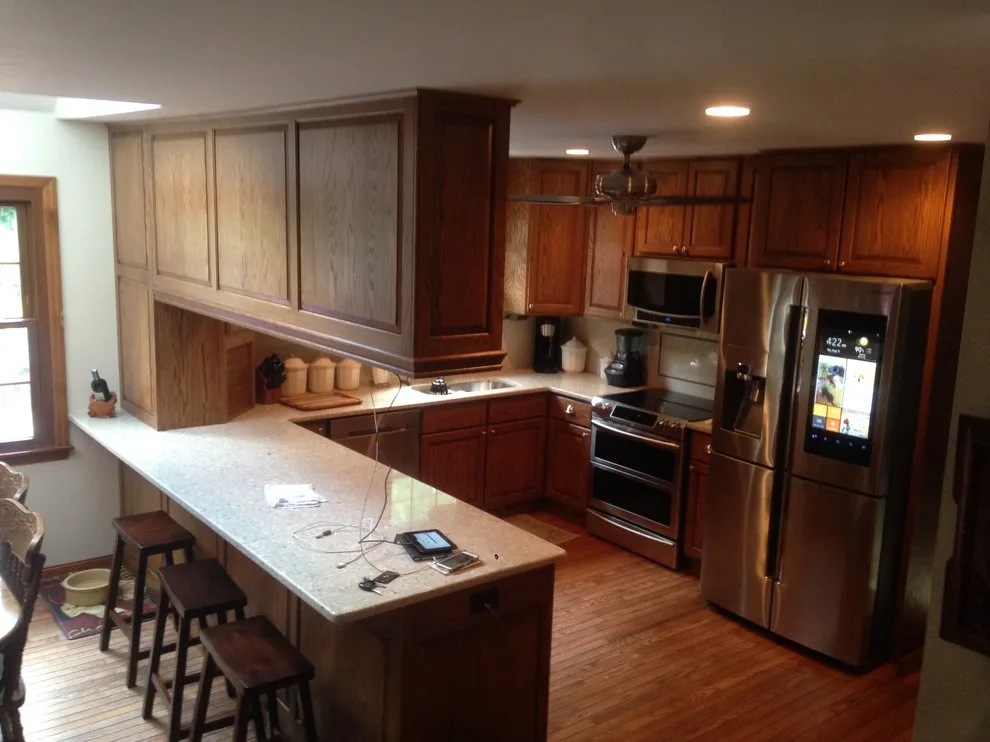 Classic Kitchen with Sleek Backsplash by In A Week. Guaranteed - Photo 3