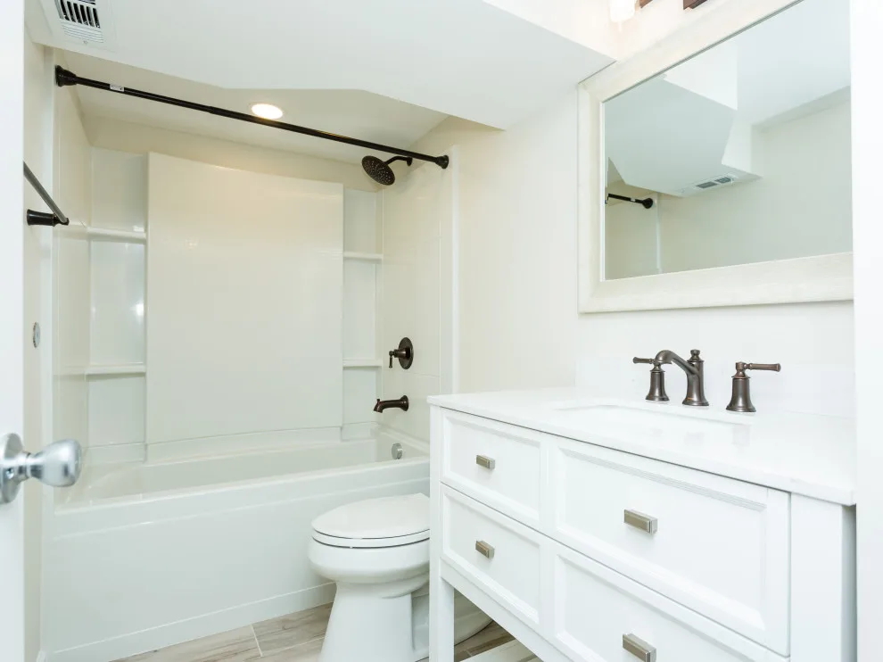 Classic White Kitchen and Bathroom in St. Louis by More For Less Remodeling - Photo 3
