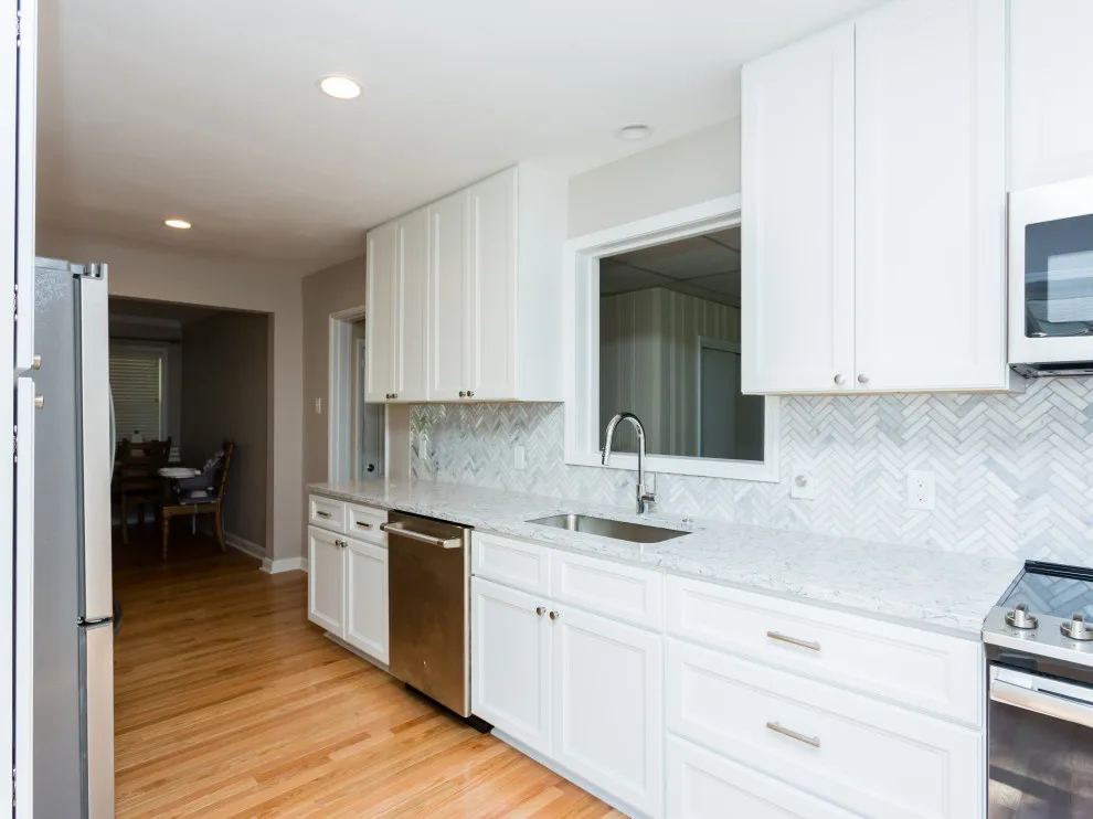 Classic White Kitchen and Bathroom in St. Louis by More For Less Remodeling - Photo 6