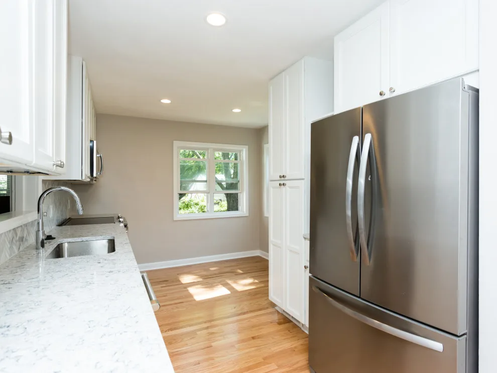 Classic White Kitchen and Bathroom in St. Louis by More For Less Remodeling - Photo 5