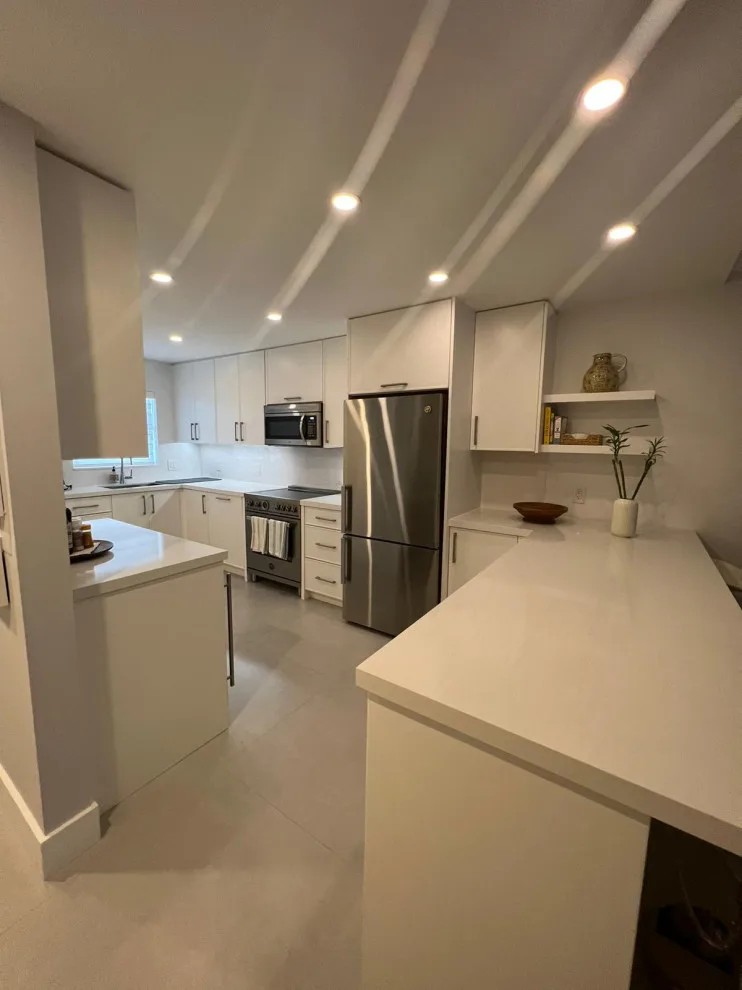 Satin White Slim Shaker Door Kitchen Remodel Completed by Kitchen Solvers Of Fort Lauderdale - Photo 6