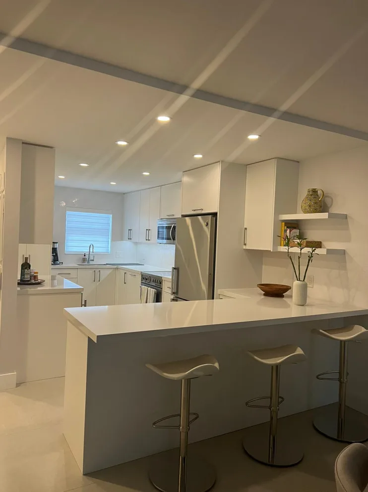 Satin White Slim Shaker Door Kitchen Remodel Completed by Kitchen Solvers Of Fort Lauderdale - Photo 4