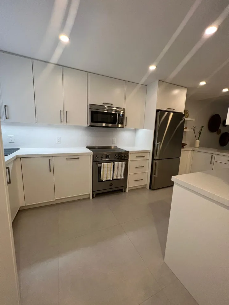 Satin White Slim Shaker Door Kitchen Remodel Completed by Kitchen Solvers Of Fort Lauderdale - Photo 3