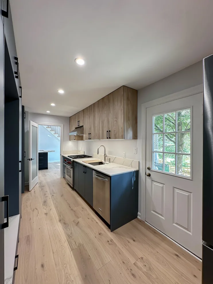 Navy and White Kitchen Design with a Transitional Style by UCS Kitchen Design - Photo 11