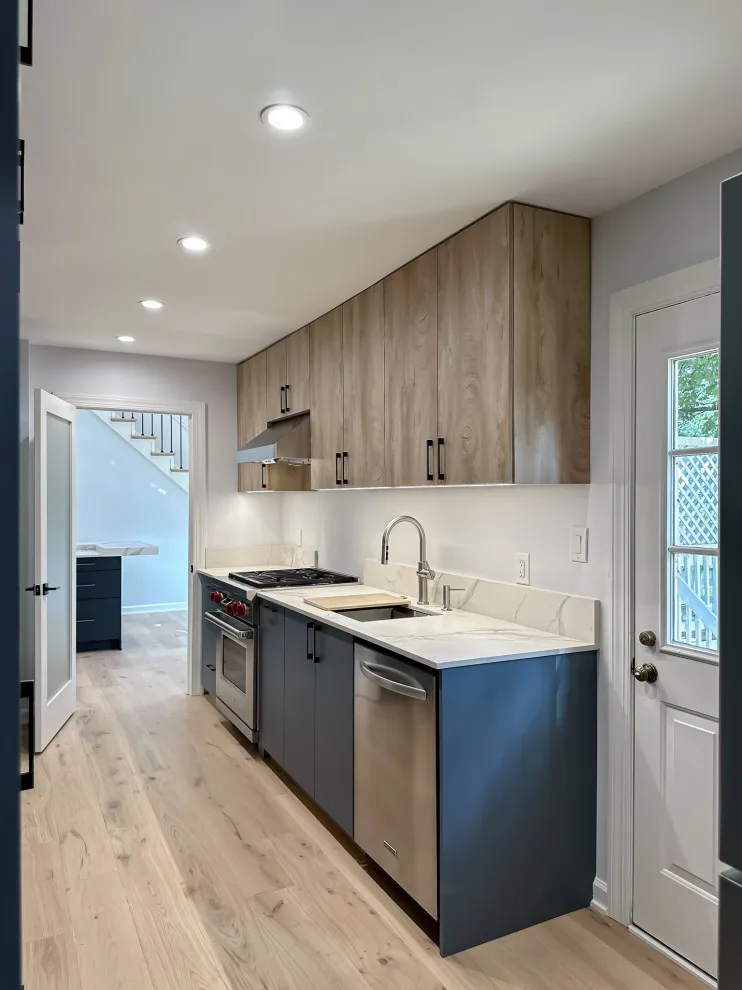 Navy and White Kitchen Design with a Transitional Style by UCS Kitchen Design - Photo 6
